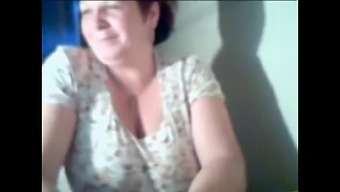 Older Woman Reveals Her Breasts On Camera